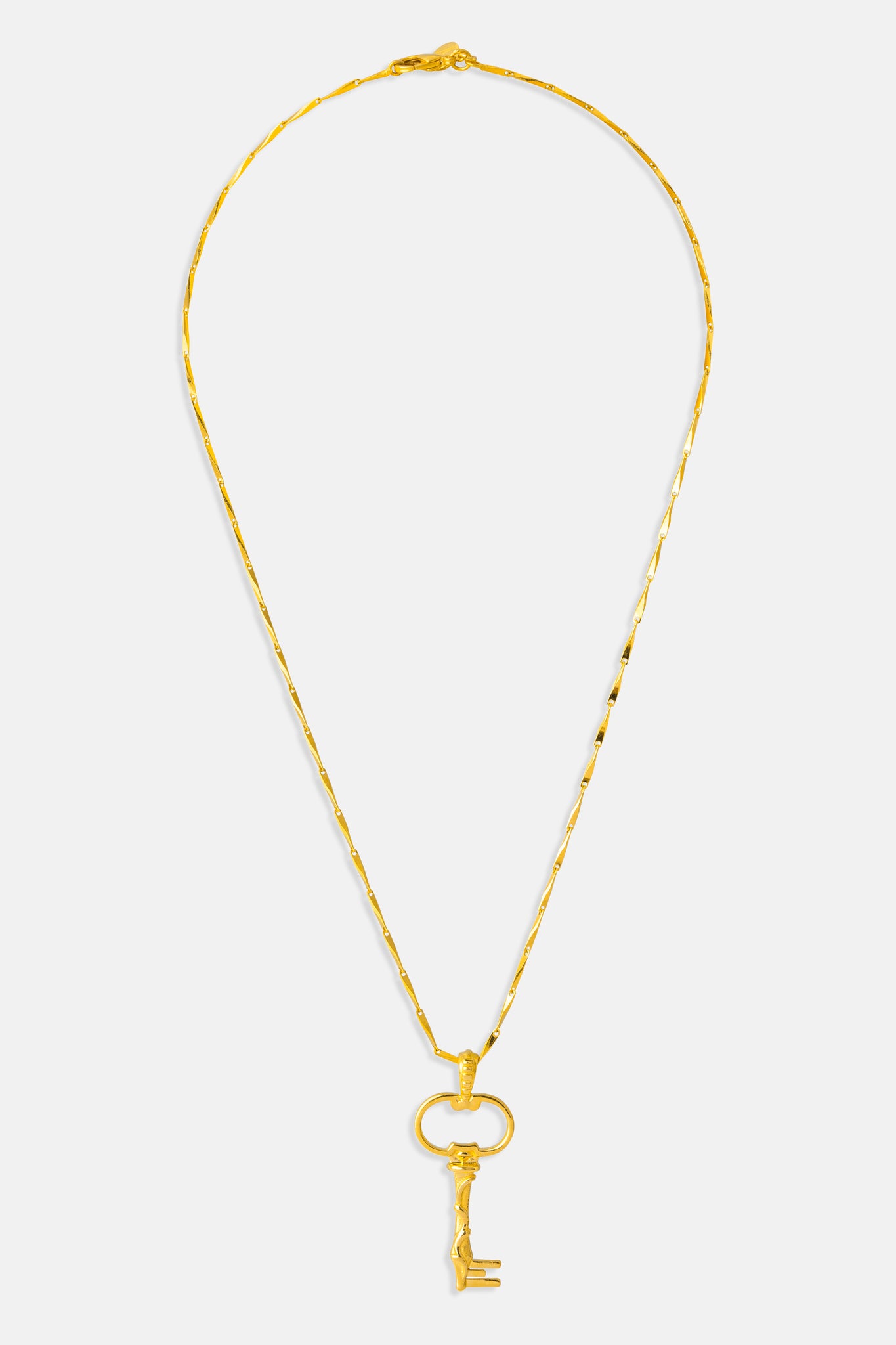 collier pendentif clé or jaune Mmaour Paris bijoux